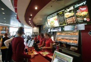 13256789-krakow-poland-april-2012-customers-are-buying-fast-food-products-inside-a-kfc-kentucky-fried-chicken